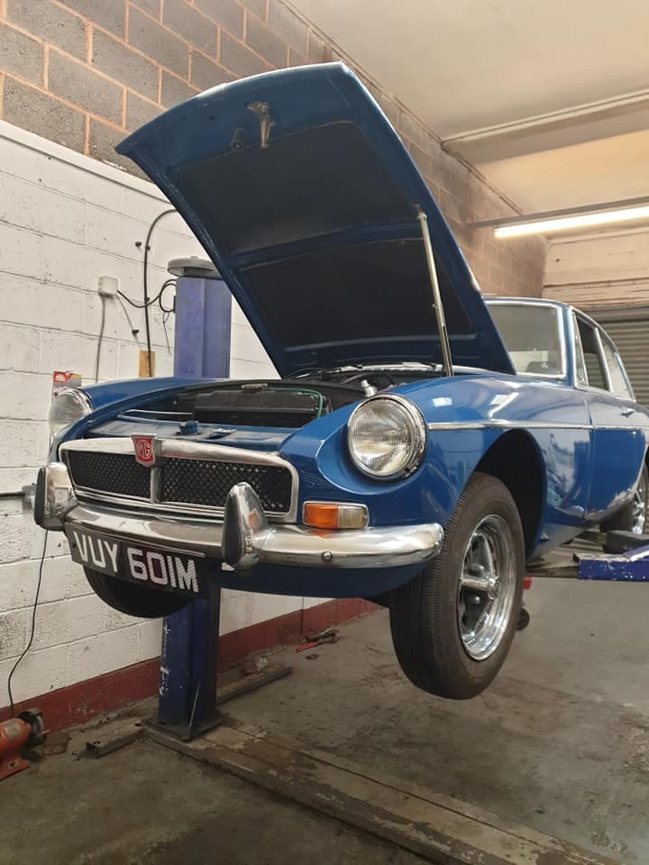 Mechanic working on a car